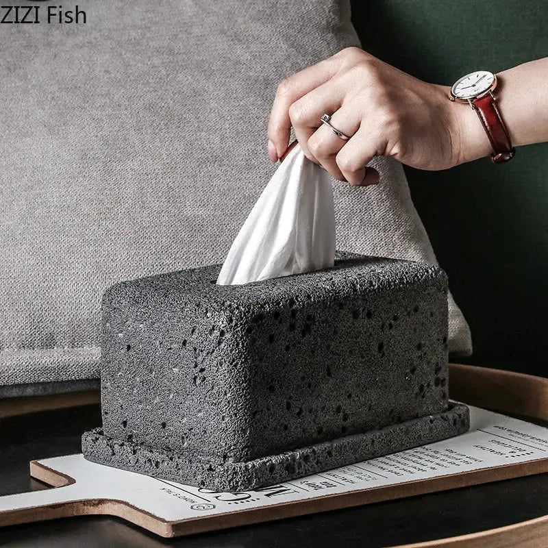 Minimalist dark gray concrete tissue box rack with textured finish and rectangular design for kitchen decor