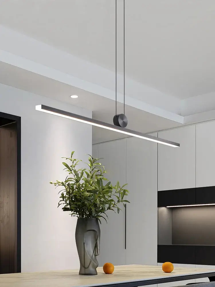 Modern minimalist pendant light with sleek matte black finish and linear design in decorbites black chandelier style