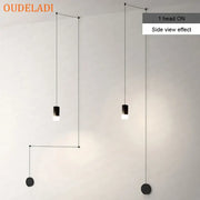 Minimalist black decorbites industrial retro pendant lights with sleek design and thin cables for modern kitchen decor
