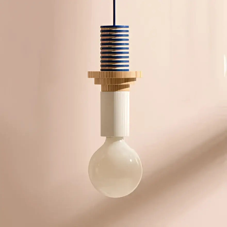 Minimalist earth tone pendant light with striped blue and white ceramic top wooden accents and frosted glass bulb decorbites colorful nordic wood