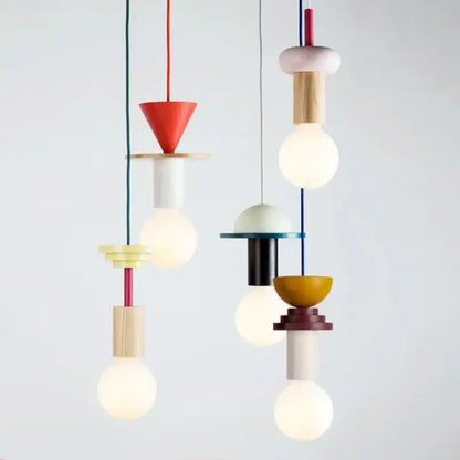 Minimalist earth tone wood and ceramic pendant light with colorful nordic wood and metal accents for dining room decorbites