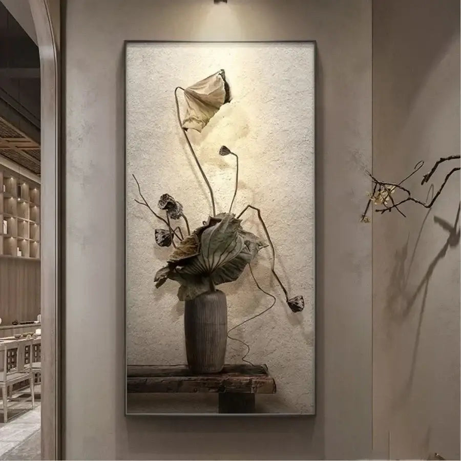 A minimalist earthy led wall lamp featuring a framed canvas of textured lotus stems in a gray vase for bedroom decor