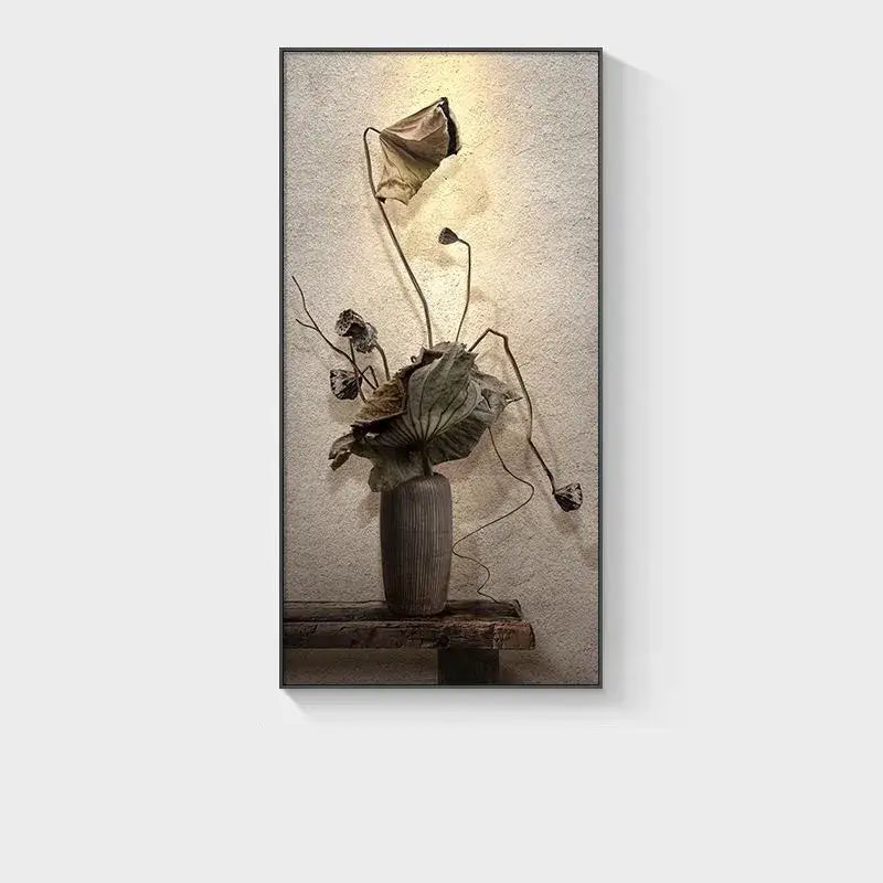 Minimalist earthy led wall lamp with tall gray ceramic vase holding dried lotus leaves against rustic bedroom wall