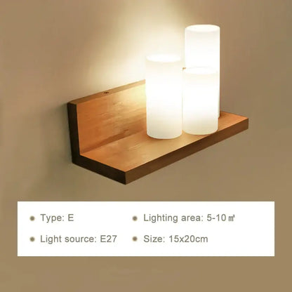 Minimalist wooden wall lamp with three frosted glass cylindrical lights and pull chain for bedroom use