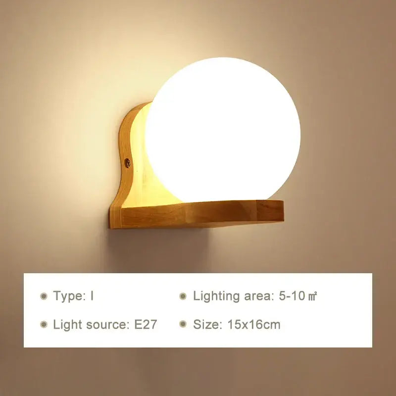 Minimalist warm-toned frosted glass wooden wall lamp with spherical design and natural wood base for bedroom use