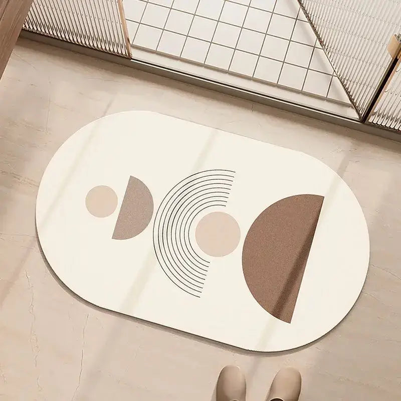 Minimalist geometric diatom ooze bathroom rug in cream beige with abstract geometric patterns in taupe and black