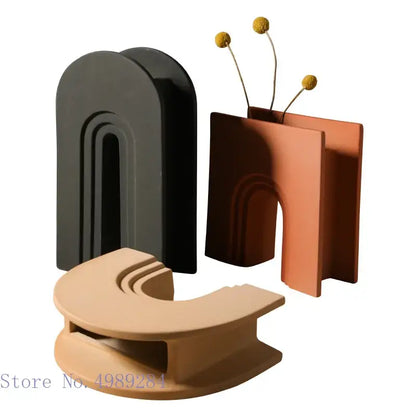 Three modern ceramic vases in black terracotta and beige with geometric stripes for living room decorbites decor