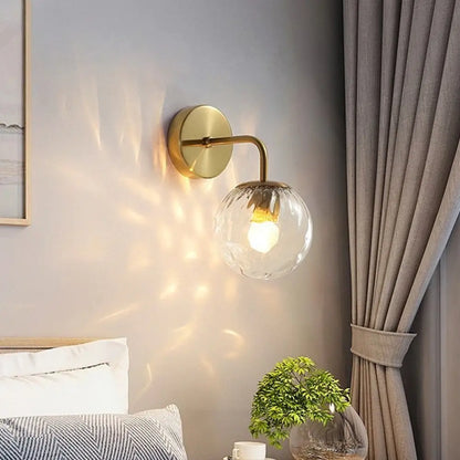 DecorBites™ DecorBites™ Minimalist Glass Ball Wall Lamp with Ripple Effect and Bent Arm in Black/Gold - Ideal for Bedroom Lighting