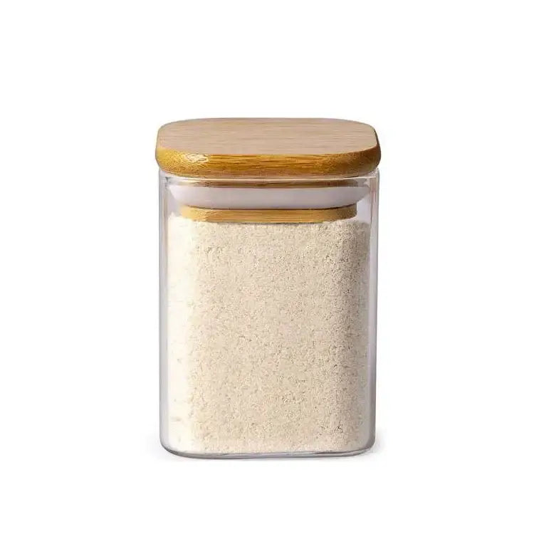 Minimalist clear glass jar with bamboo lid filled with white flour decorbites glass jar for kitchen storage