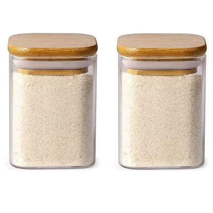 Minimalist decorbites glass jar set with clear glass rectangular jars and bamboo lids filled with white flour for kitchen storage