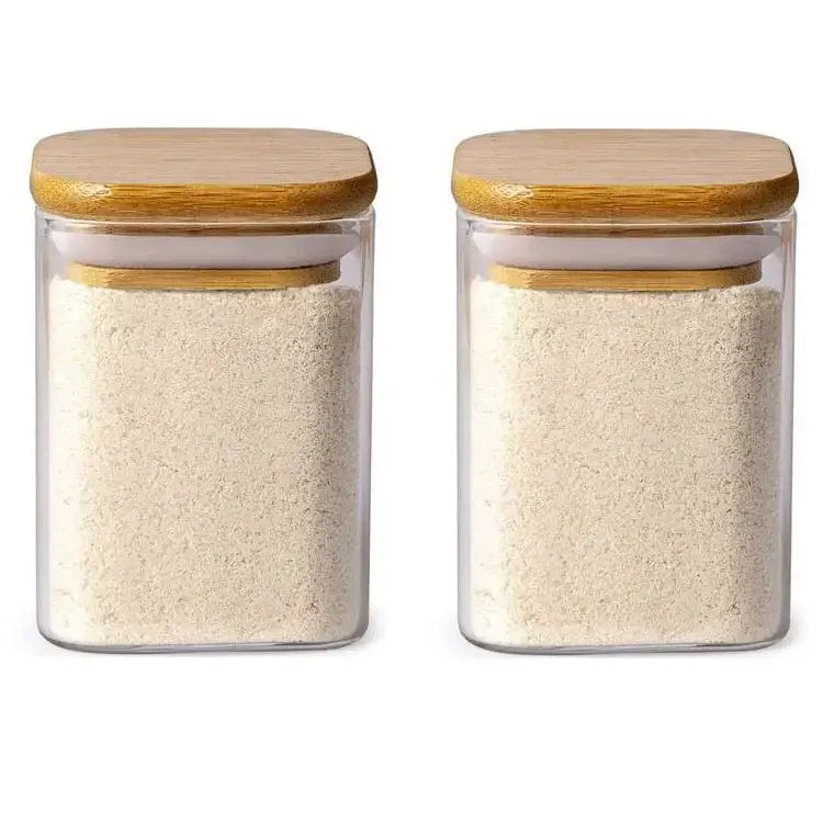 Minimalist decorbites glass jar set with clear glass rectangular jars and bamboo lids filled with white flour for kitchen storage