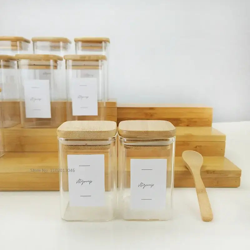 Minimalist clear glass jar with bamboo lid and white label by decorbites glass for kitchen storage