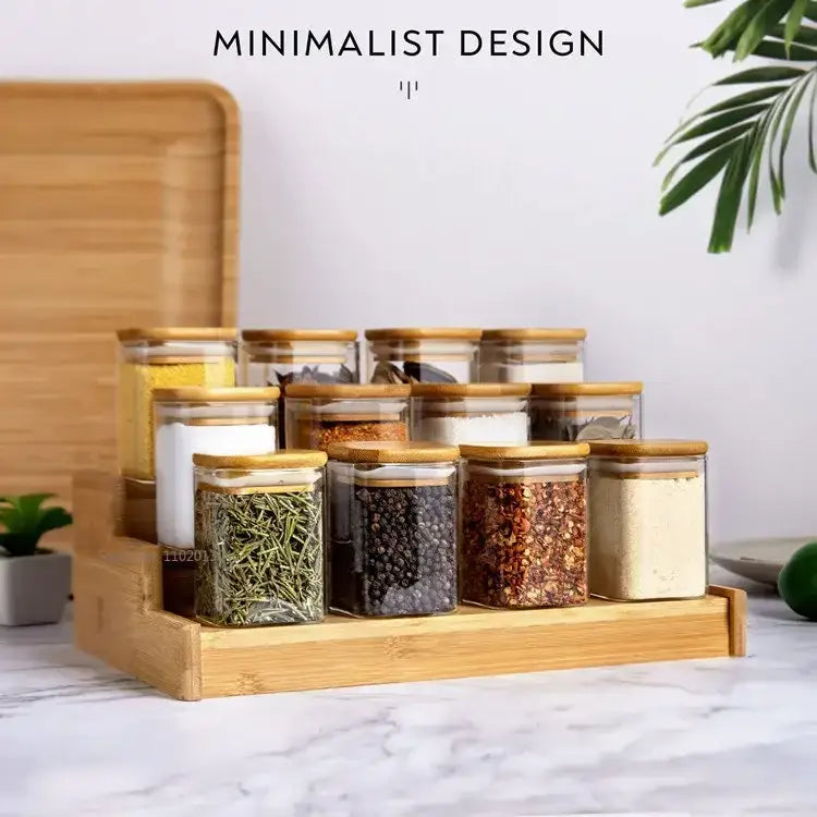 Set of clear glass jars with bamboo lids on a wooden tray for kitchen storage by decorbites glass jar