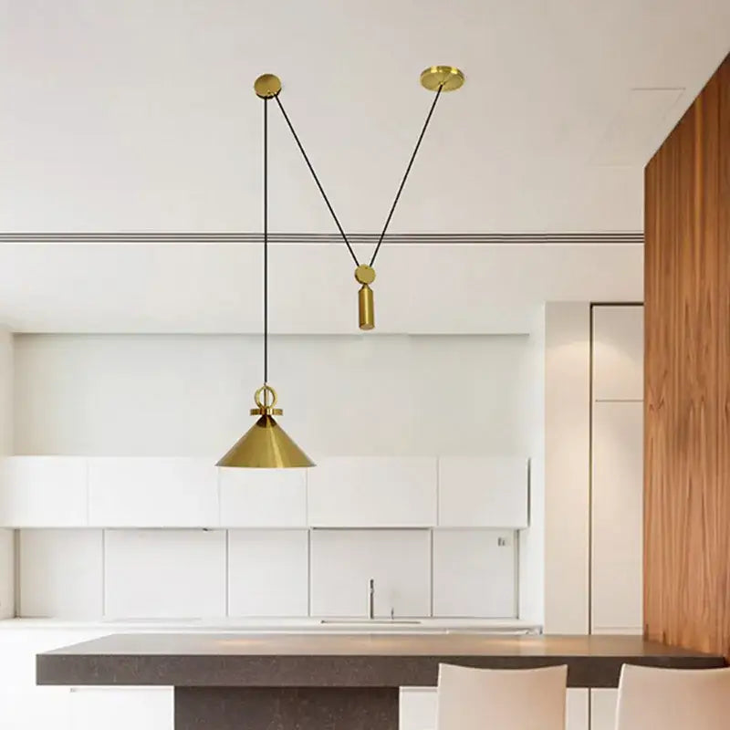Gold-colored conical adjustable linear pendant lights by decorbites with sleek minimalist design for dining room decor