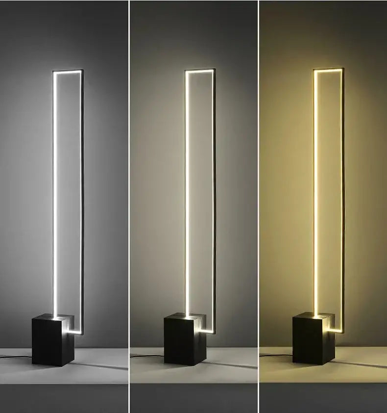 Minimalist gold and black geometric led floor lamp with sleek black cube base and tall rectangular light strip by decorbites