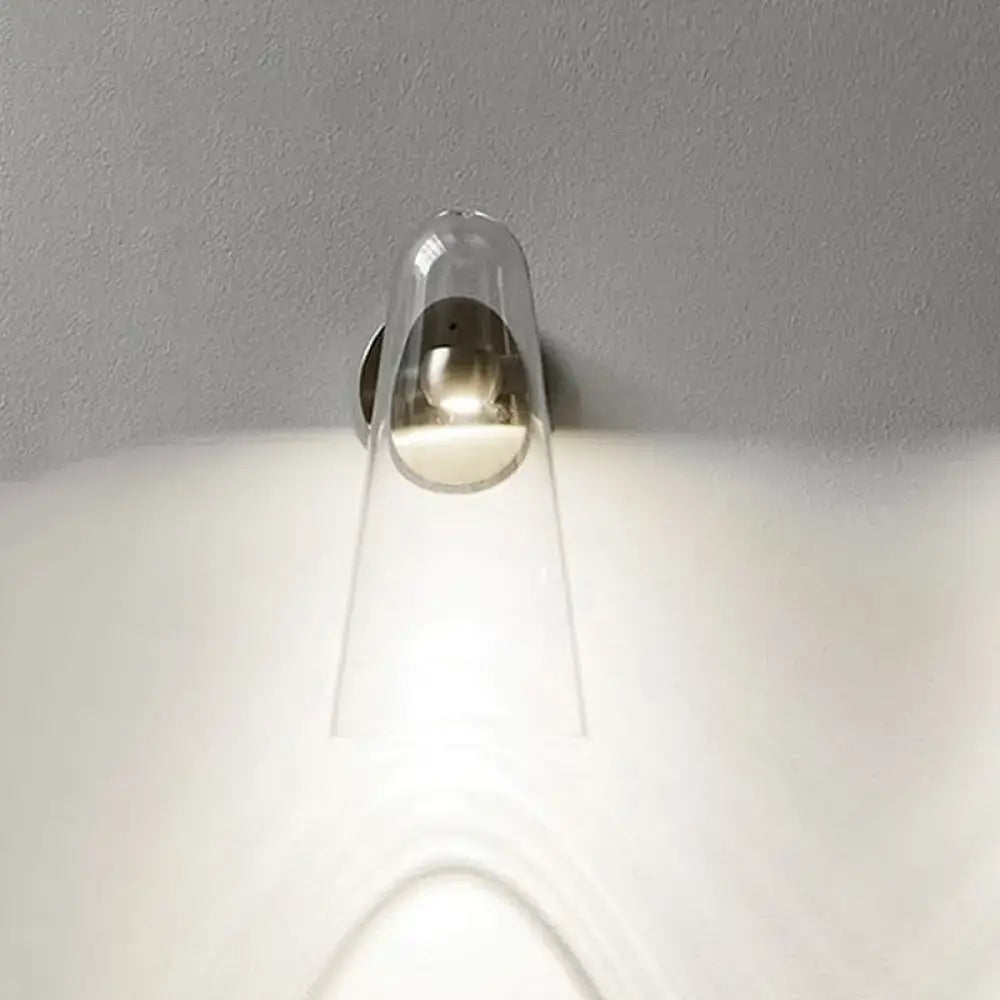 Minimalist gold and clear acrylic wall mount lighting with a sleek transparent acrylic sconce and polished metallic base
