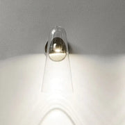 Minimalist gold and clear acrylic wall mount lighting with a sleek transparent acrylic sconce and polished metallic base