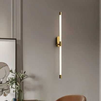 Minimalist gold-toned decorbites acrylic line led wall lights with sleek cylindrical acrylic line led tube for bedroom