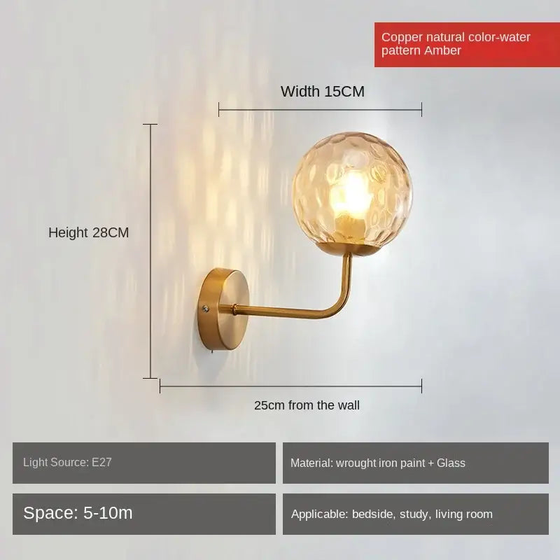 Copper finished wall lamp with textured amber glass globe featuring decorbites glass ball led design for bedroom light