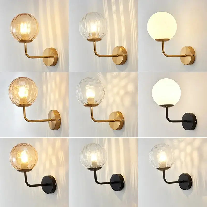 Minimalist gold and black metal wall lamp with decorbites glass ball led shades in clear textured and frosted finishes