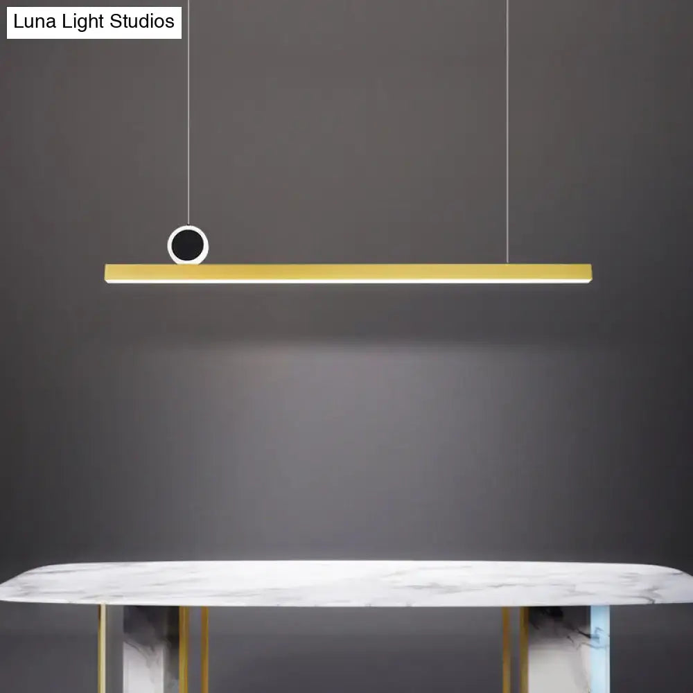 Gold bar pendant ceiling light fixture by decorbites with gold linear design and black circular accent with gear color temperature