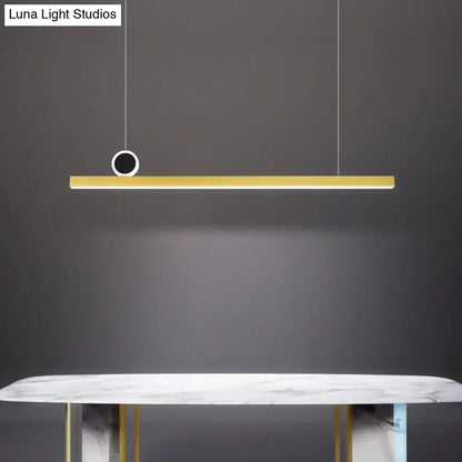 Gold bar pendant ceiling light fixture by decorbites with gold linear design and black circular accent with gear color temperature