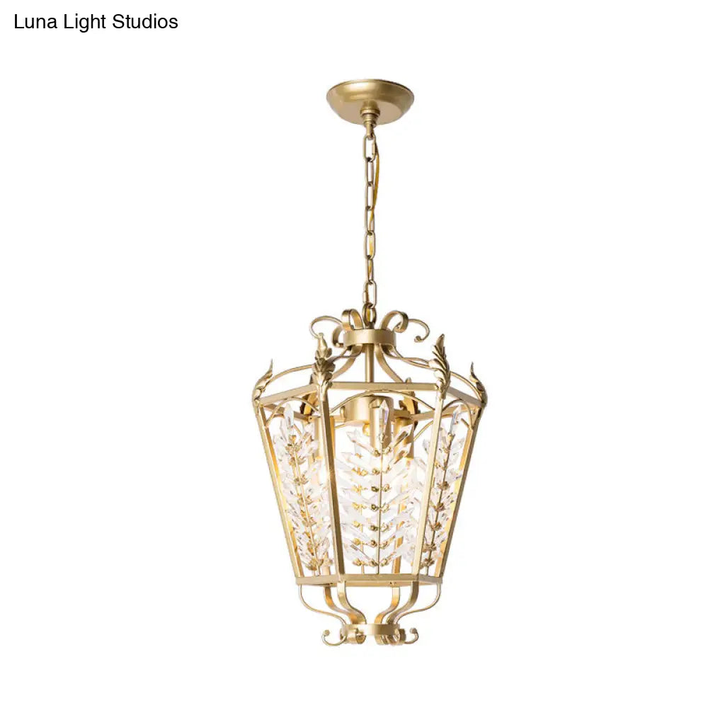 Lámpara de araña minimalista dorada con cristales facetados y colgante en forma de tallo botánico