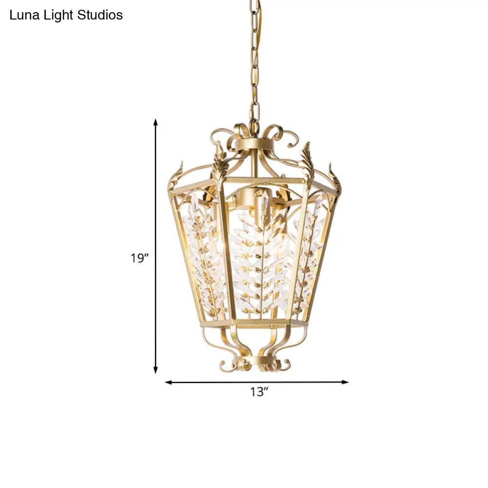 Lámpara de araña minimalista dorada con cristales facetados y colgante en forma de tallo botánico