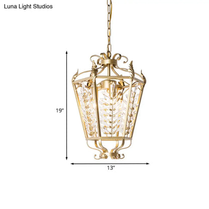 Lámpara de araña minimalista dorada con cristales facetados y colgante en forma de tallo botánico