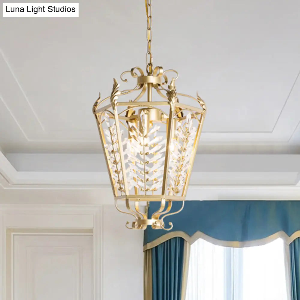 Lámpara de araña minimalista dorada con cristales facetados y colgante en forma de tallo botánico