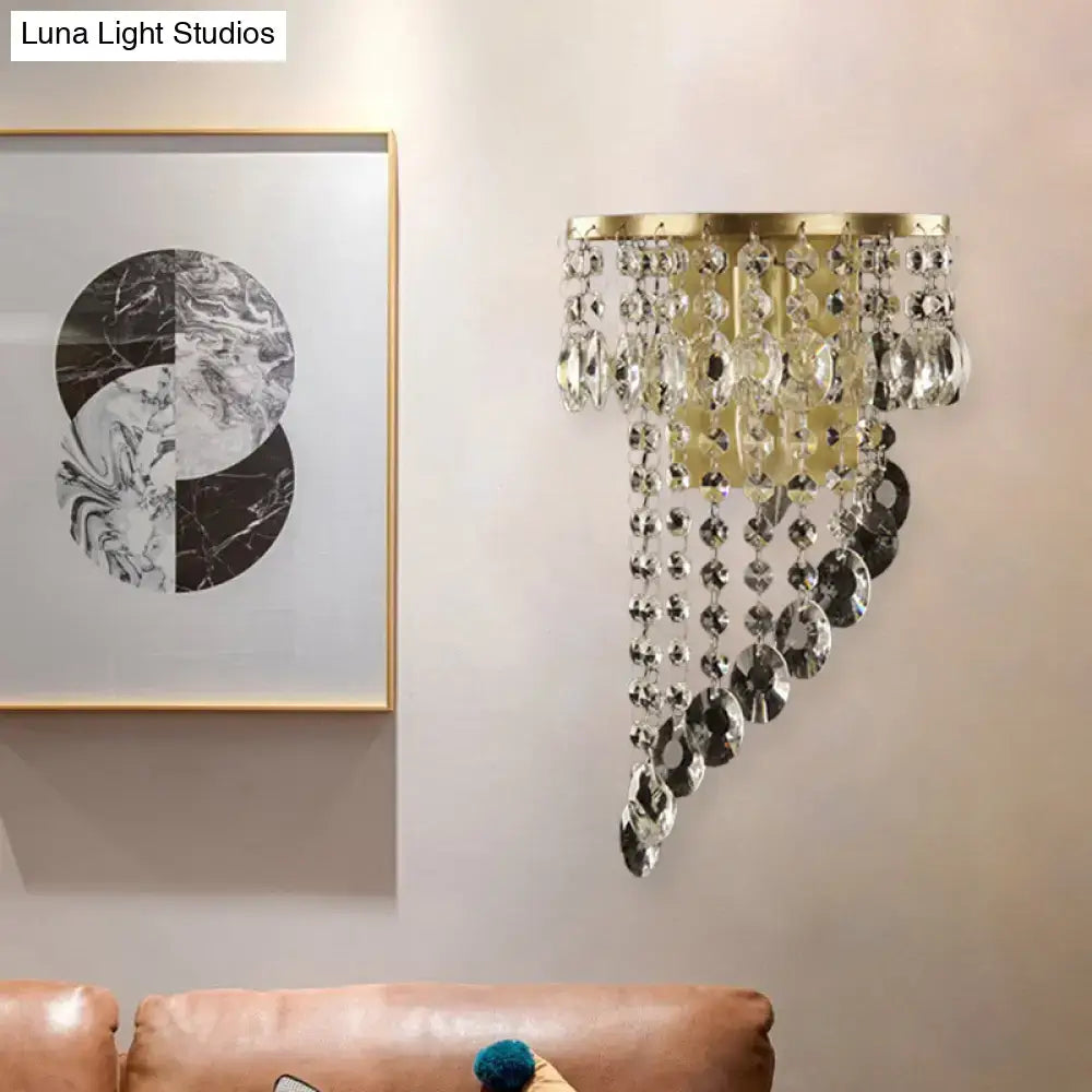 Minimalist gold-toned corridor sconce with cascading clear crystal beads and discs e12 bulb base light type