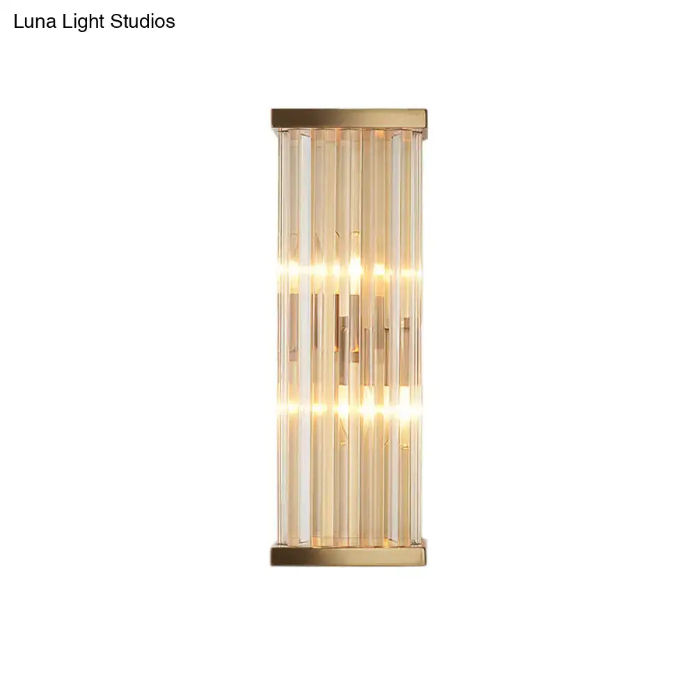 Minimalist gold crystal wall sconce with vertical rods in brushed gold metal frame compatible with e12 e14 bulbs