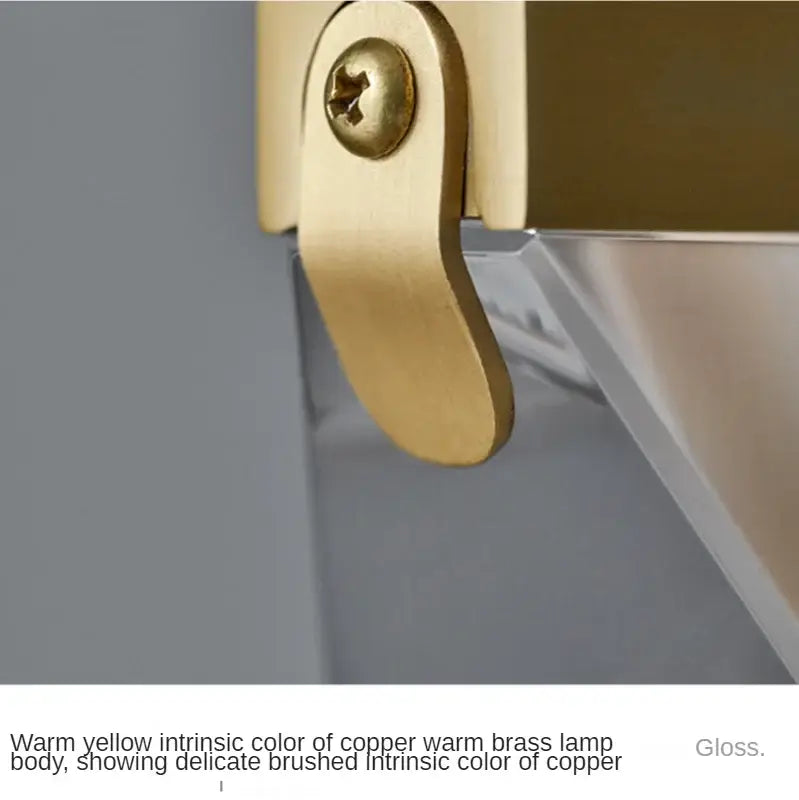 A warm brass lamp body with brushed finish and golden screw head for minimalist gold decorbites crystal chandelier