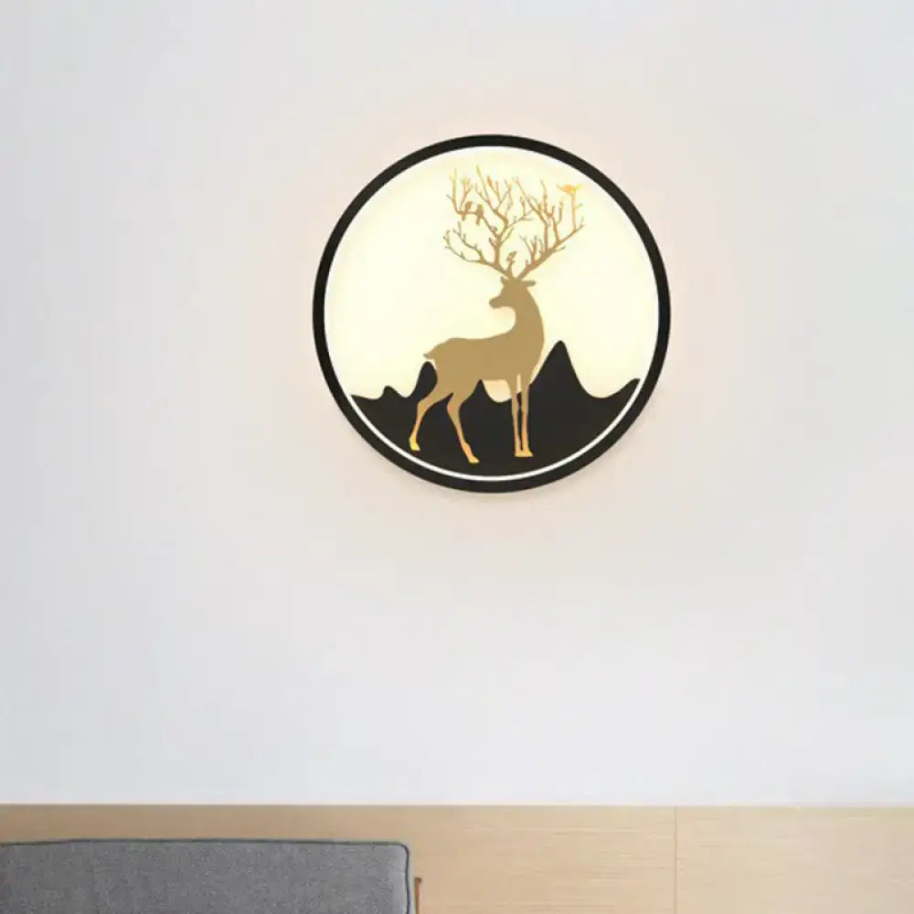 Minimalist gold deer ring led wall sconce with antlers and mountain design in a 10 inch fixture with black frame