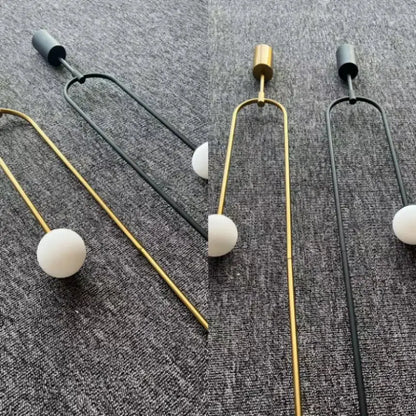 Minimalist gold double head glass ball pendant light with u-shaped metal frame and matte white spherical bulb