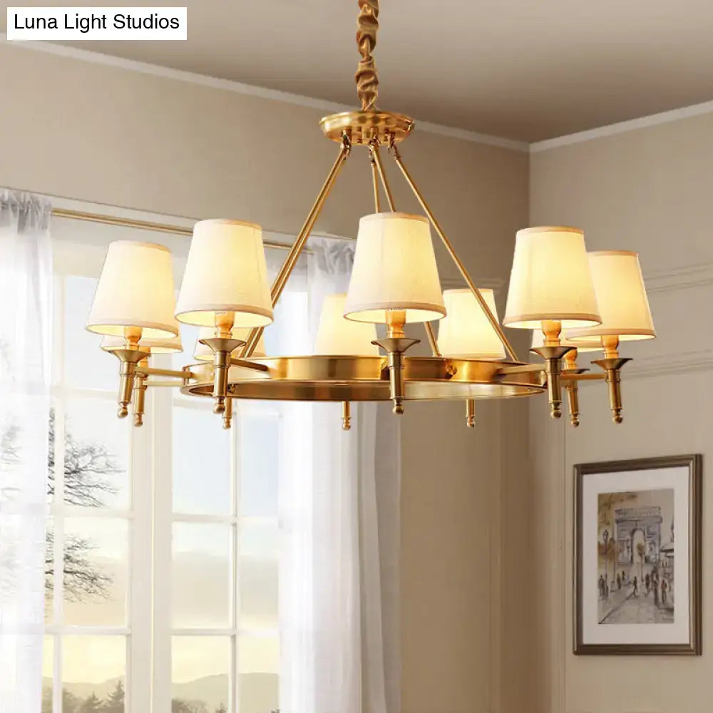 Minimalist gold fabric bedroom conical ceiling chandelier with six cream fabric shades and twisted chain suspension