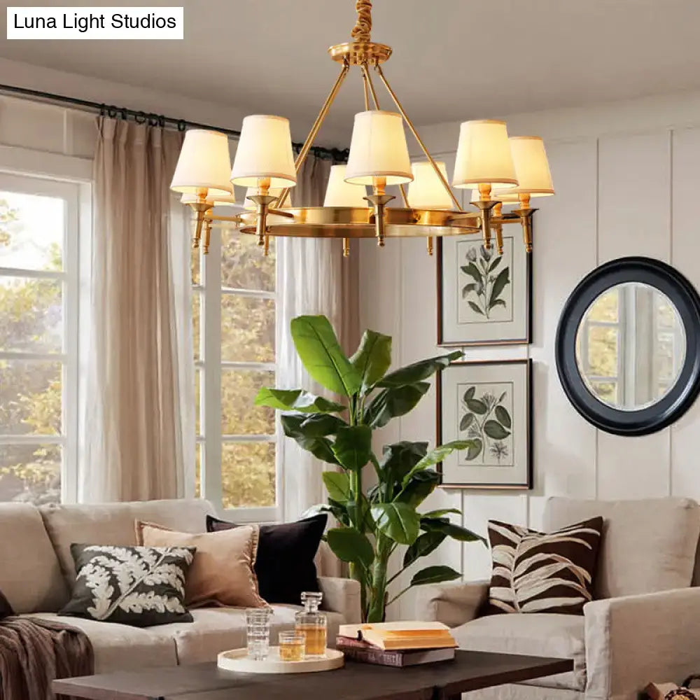 Minimalist gold fabric bedroom conical ceiling chandelier with six cream-colored fabric shades in gold tone