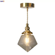 Minimalist gold led hanging light with faceted speckled bubble glass shade and twisted cord suspension for dining room