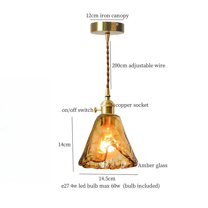 A warm amber glass minimalist gold faceted bubble led hanging light with brass iron canopy and adjustable 200cm wire