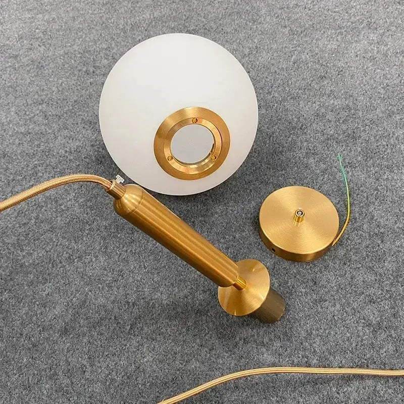 Minimalist gold glass ball led pendant chandelier with frosted white glass shade and polished brass hardware for kitchen island decorbites glass ball pendant chandelier