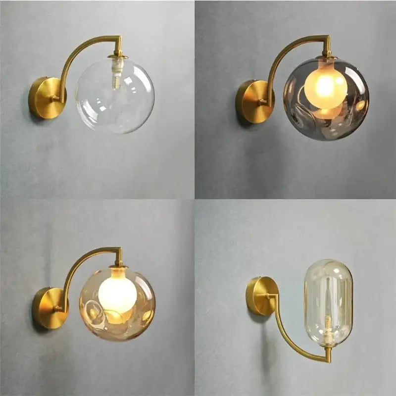 Minimalist gold wall sconce with curved arm and glass ball shade designed as a bedroom wall lamp