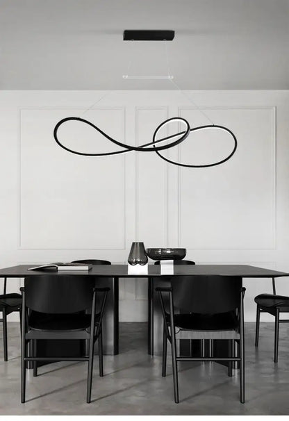Black minimalist metal dining pendant light with sleek intertwined loop design for led strip island dining room