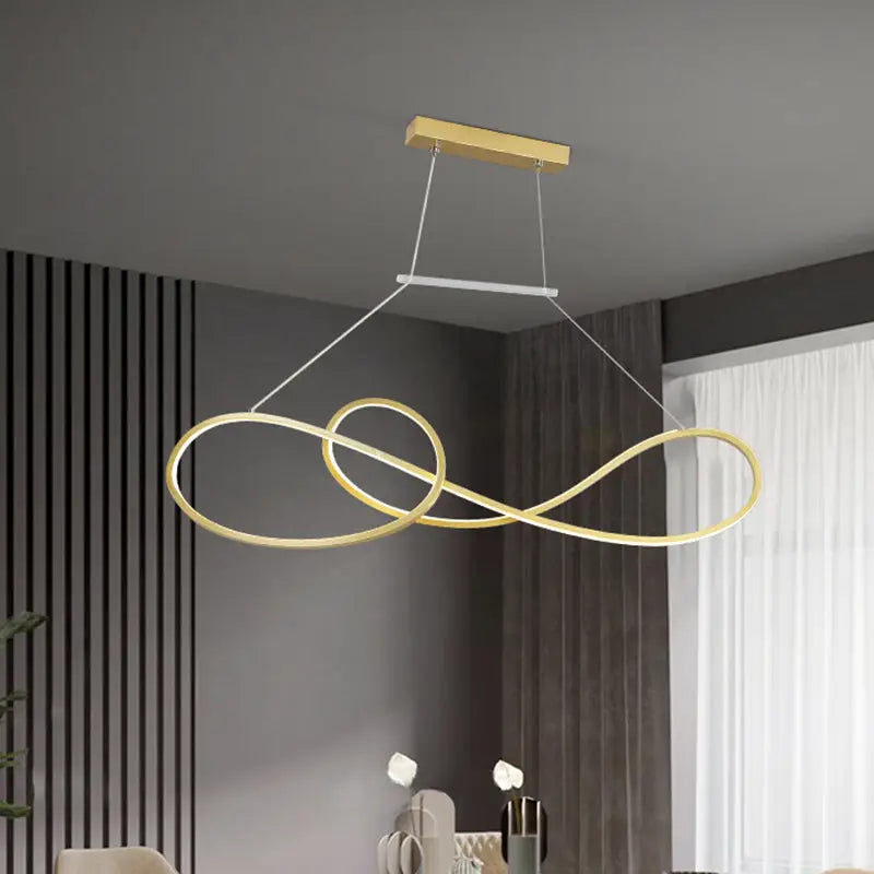 Minimalist gold infinity led strip island light with sleek metal dining room pendant for modern dining spaces