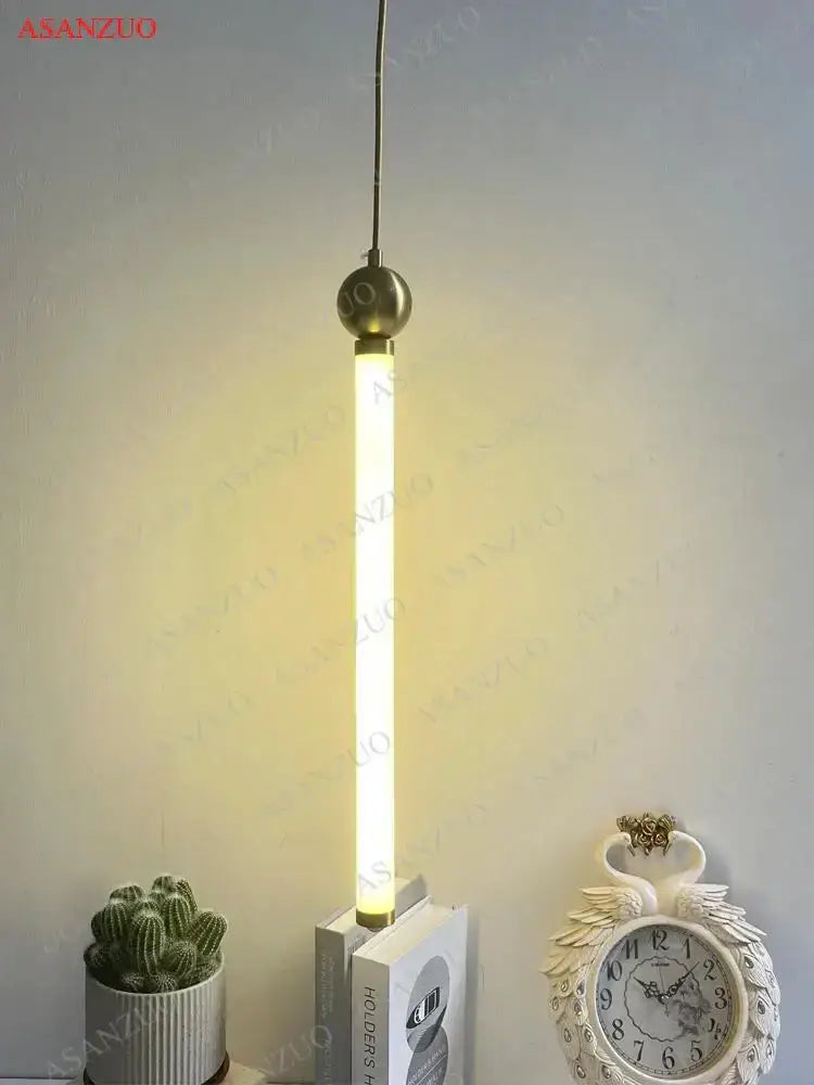 Minimalist gold pendant light with brass spherical top and warm led strip pendant for dining room decorbites led strip