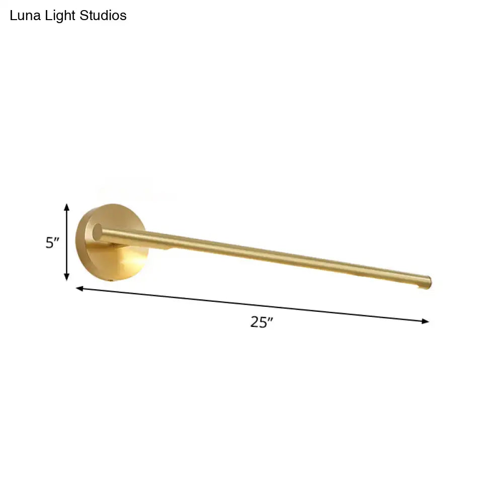 A sleek 25-inch brass towel rack with circular wall-mounted base paired with gold led wall light acrylic diffuser