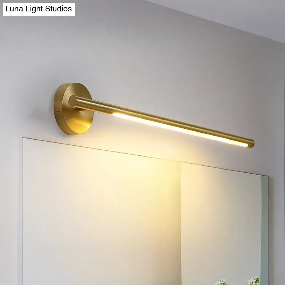 Minimalist gold wall light with acrylic diffuser featuring a sleek cylindrical design and warm led illumination