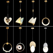 Gold nordic pendant lights with minimalist gold-toned metal and circular fan-shaped glass shades for kitchen decorbites decor