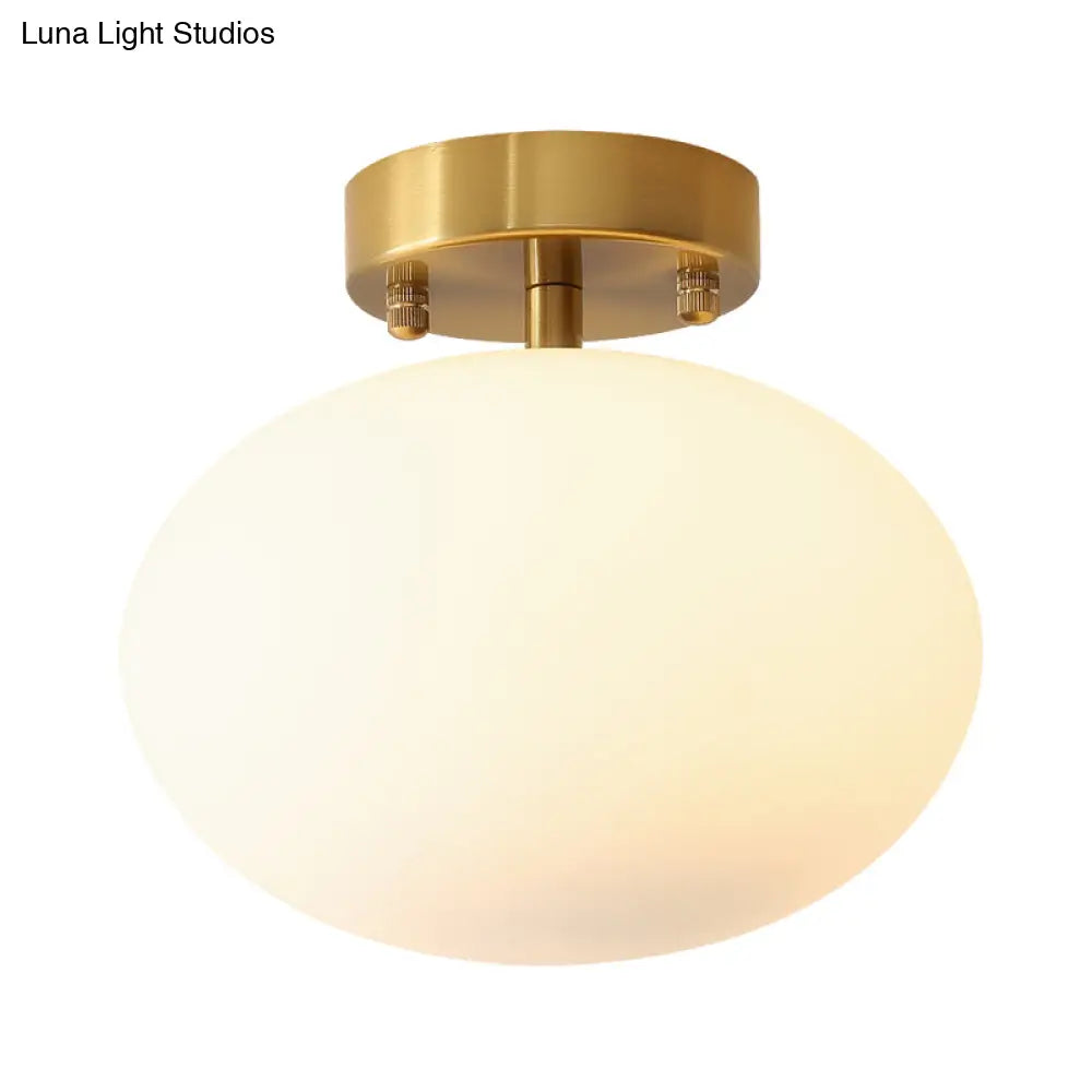 Minimalist Gold Oval Semi Flush Ceiling Light - 1-Light Cream Glass Lamp for Bedroom