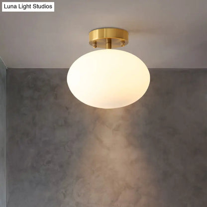 Minimalist Gold Oval Semi Flush Ceiling Light - 1-Light Cream Glass Lamp for Bedroom