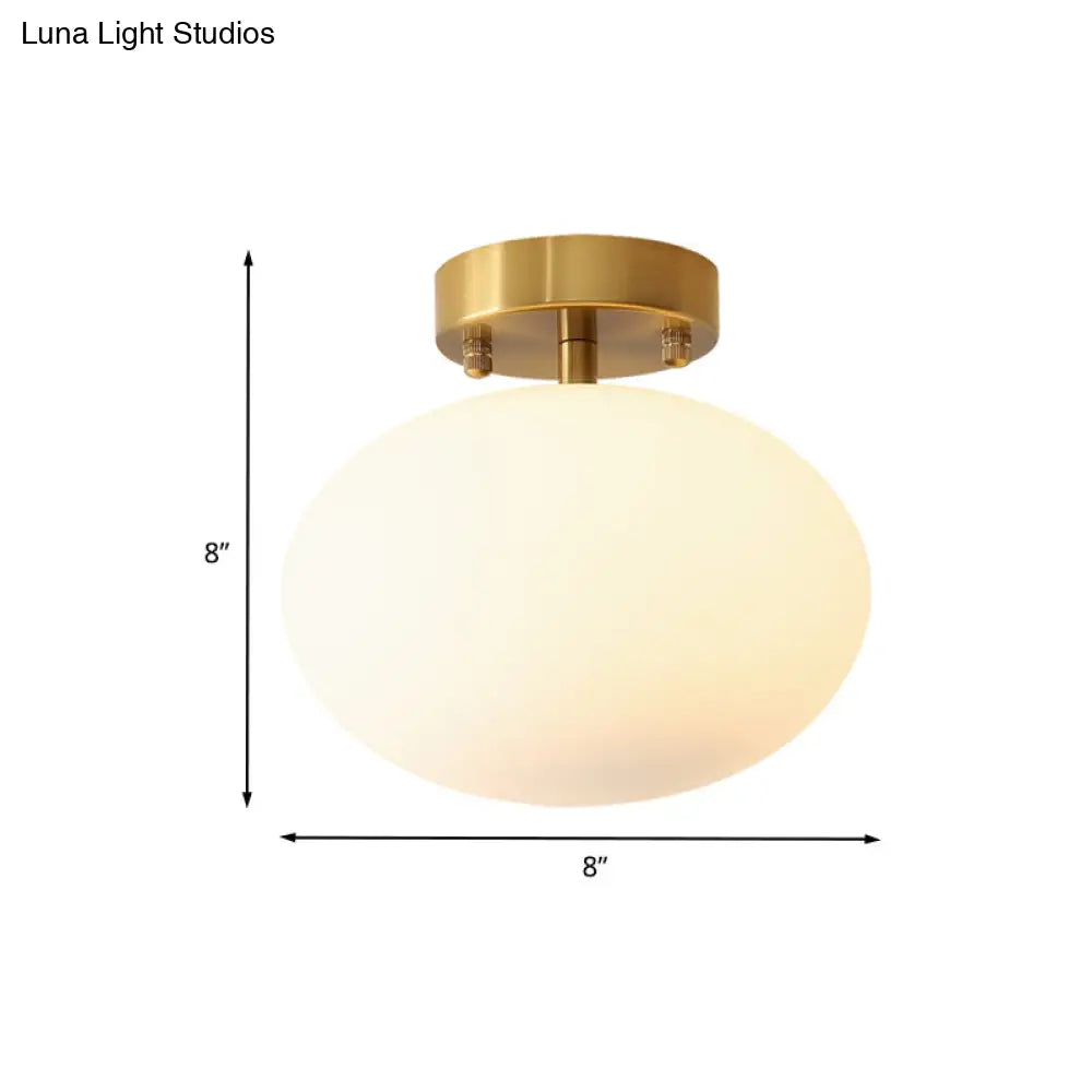 Minimalist Gold Oval Semi Flush Ceiling Light - 1-Light Cream Glass Lamp for Bedroom